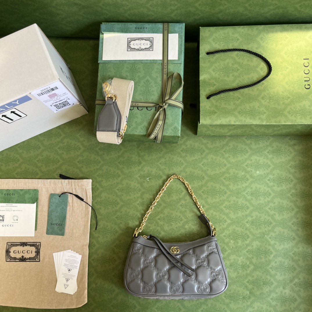 G*u*i matelassé handbag