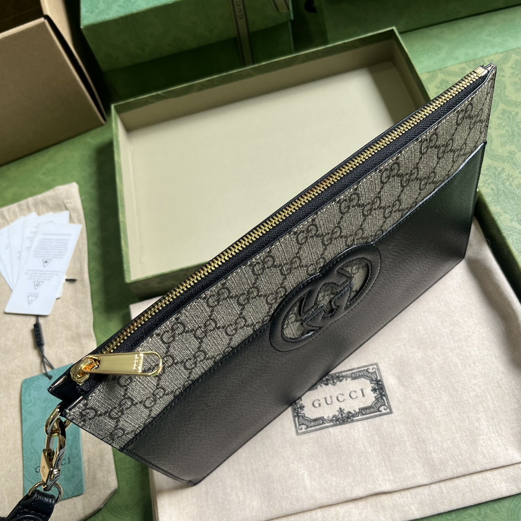 G*u*i pouch with cut-out interlocking g