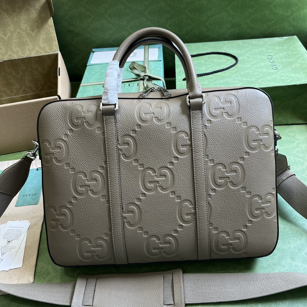 G*u*i gg embossed briefcase