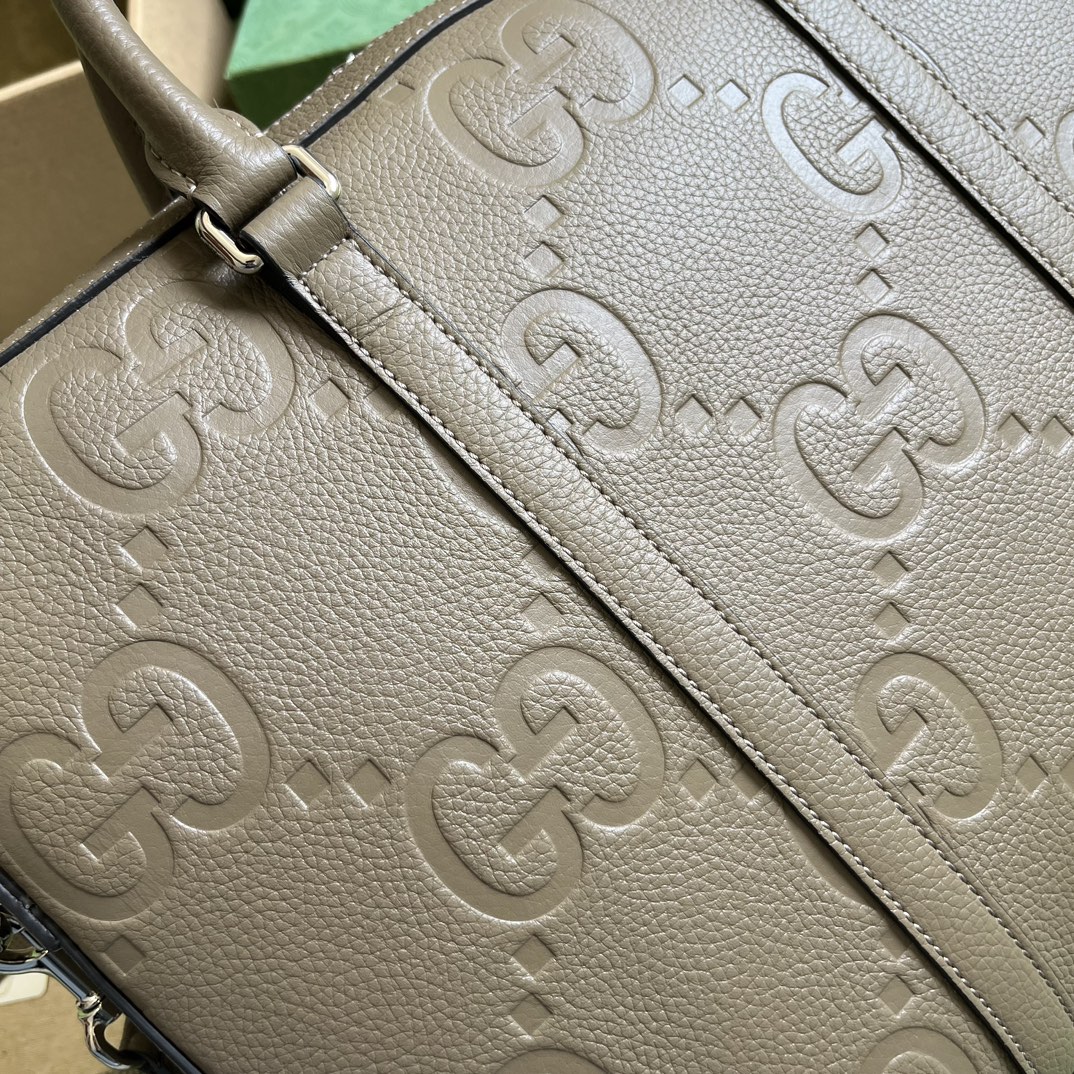 G*u*i gg embossed briefcase
