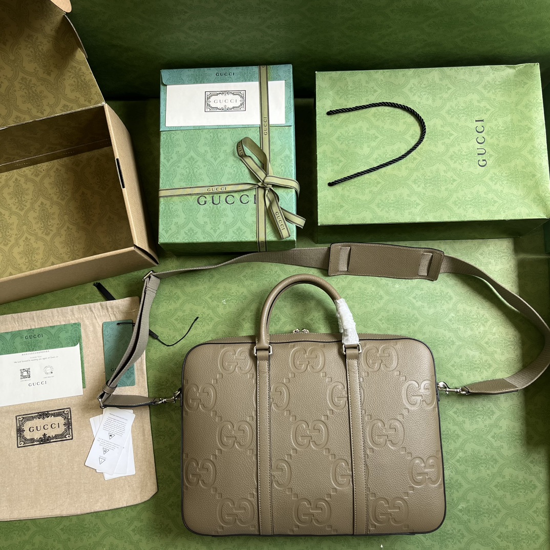 G*u*i gg embossed briefcase