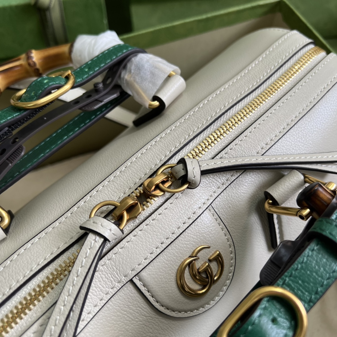 G*u*i aria handbag