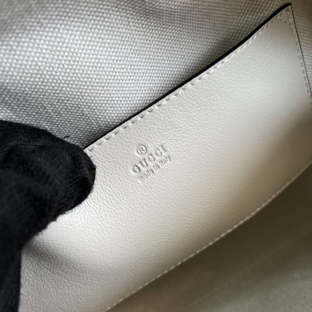 G*u*i aria handbag