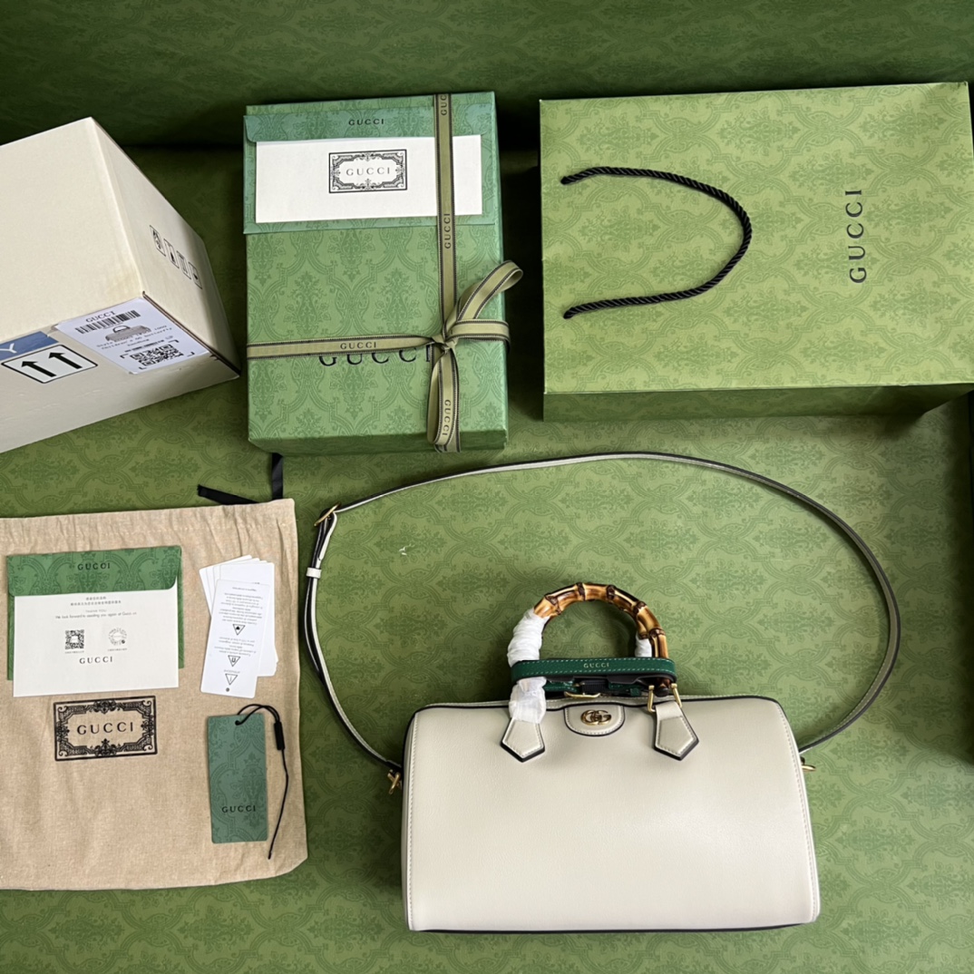 G*u*i aria handbag