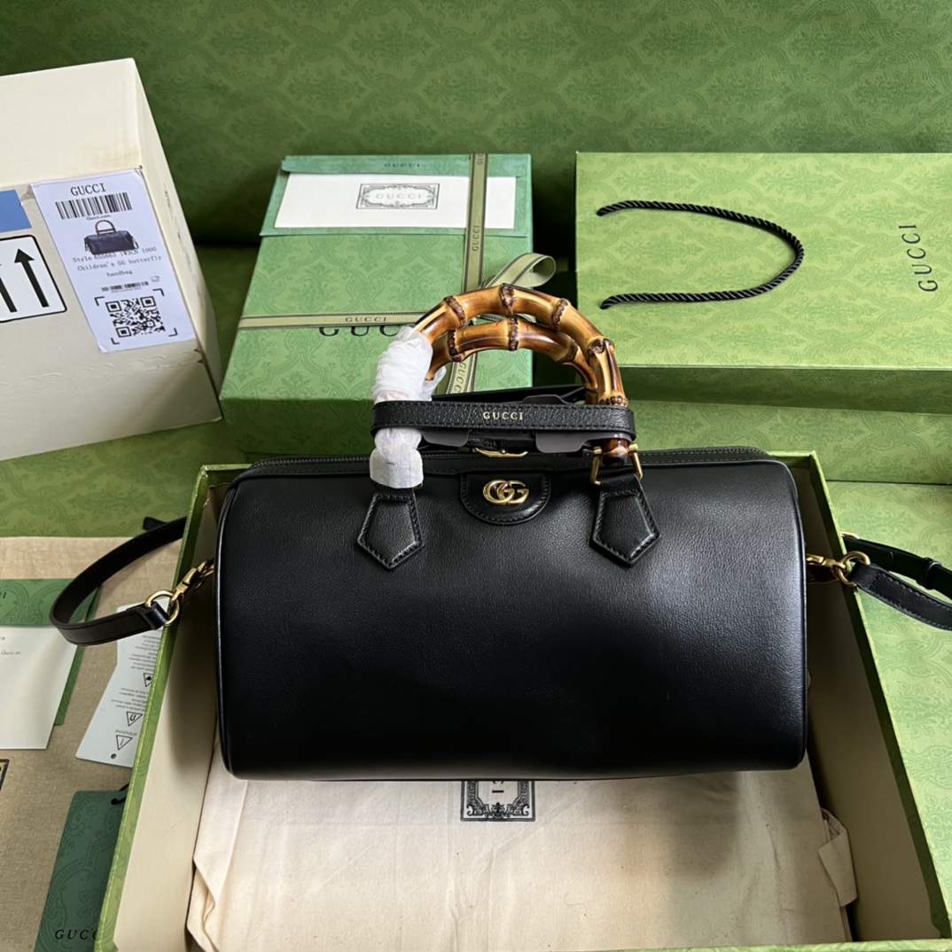 G*u*i aria handbag