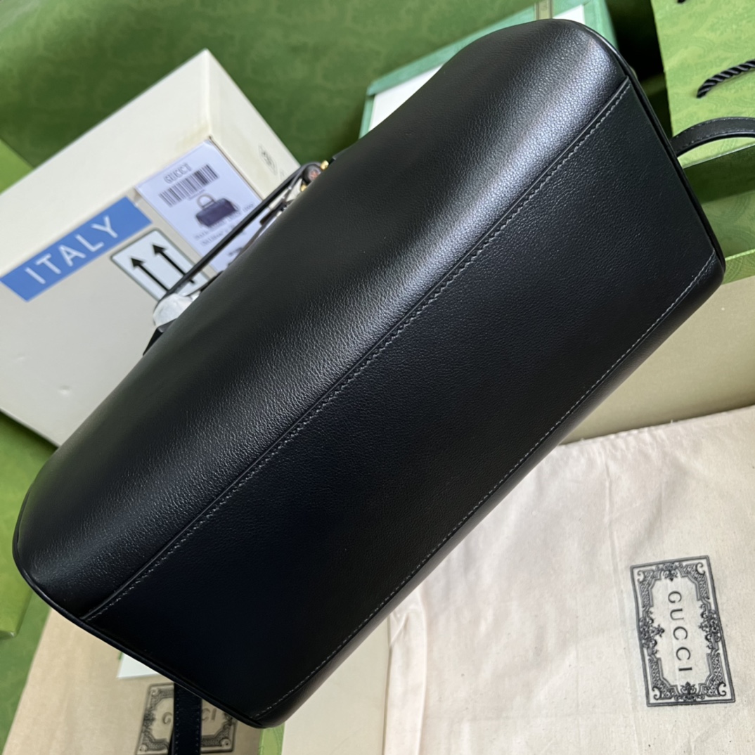 G*u*i aria handbag