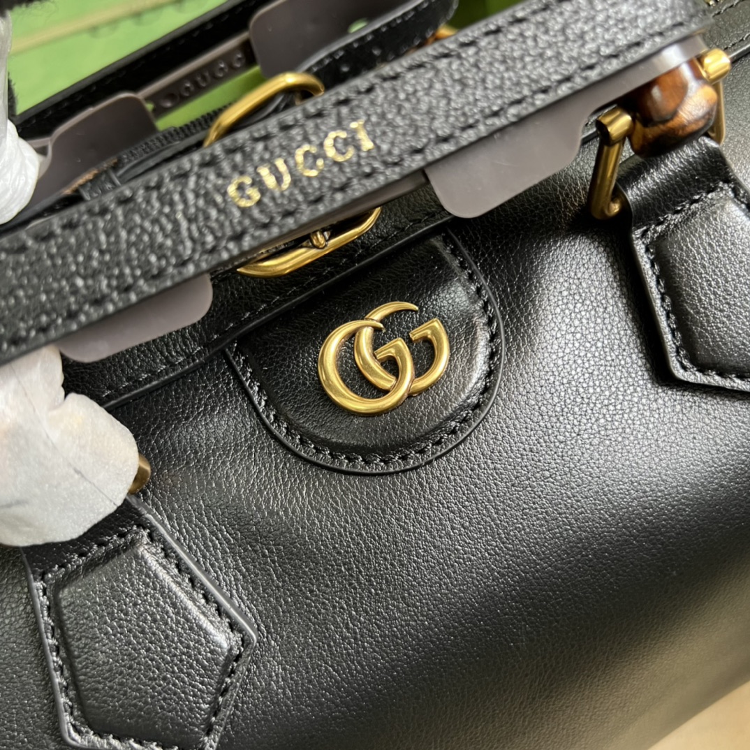 G*u*i aria handbag