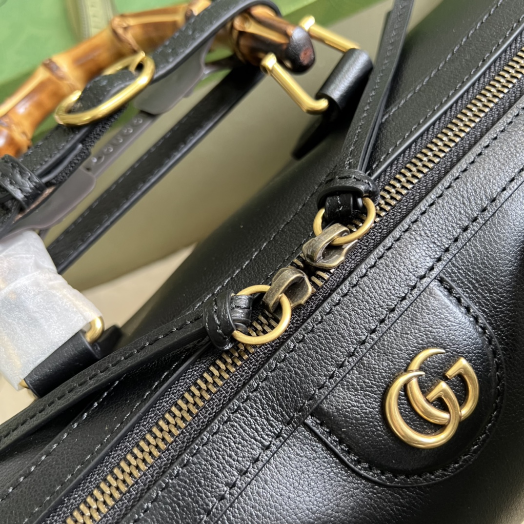 G*u*i aria handbag