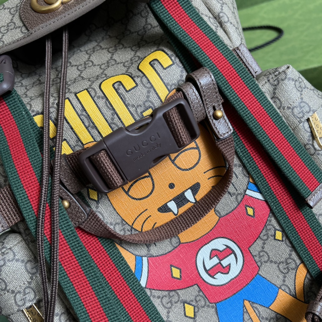 G*u*i gg skateboard backpack with web