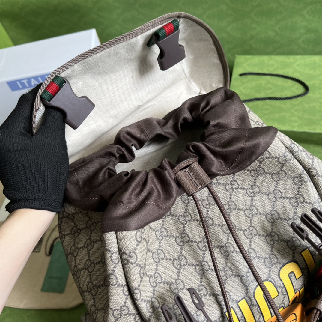 G*u*i gg skateboard backpack with web