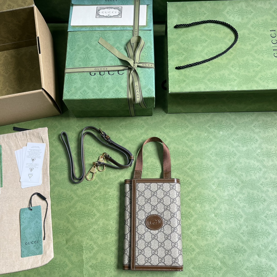 G*u*i gg top handle wallet