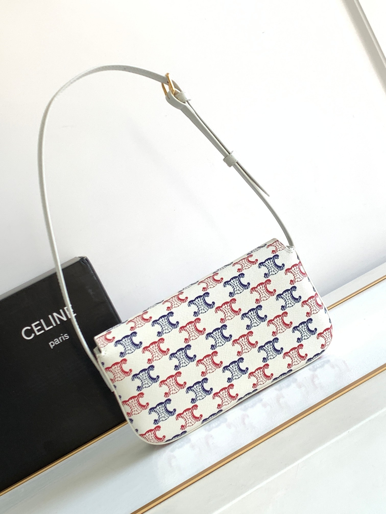 Ce**e shoulder bag triomphe