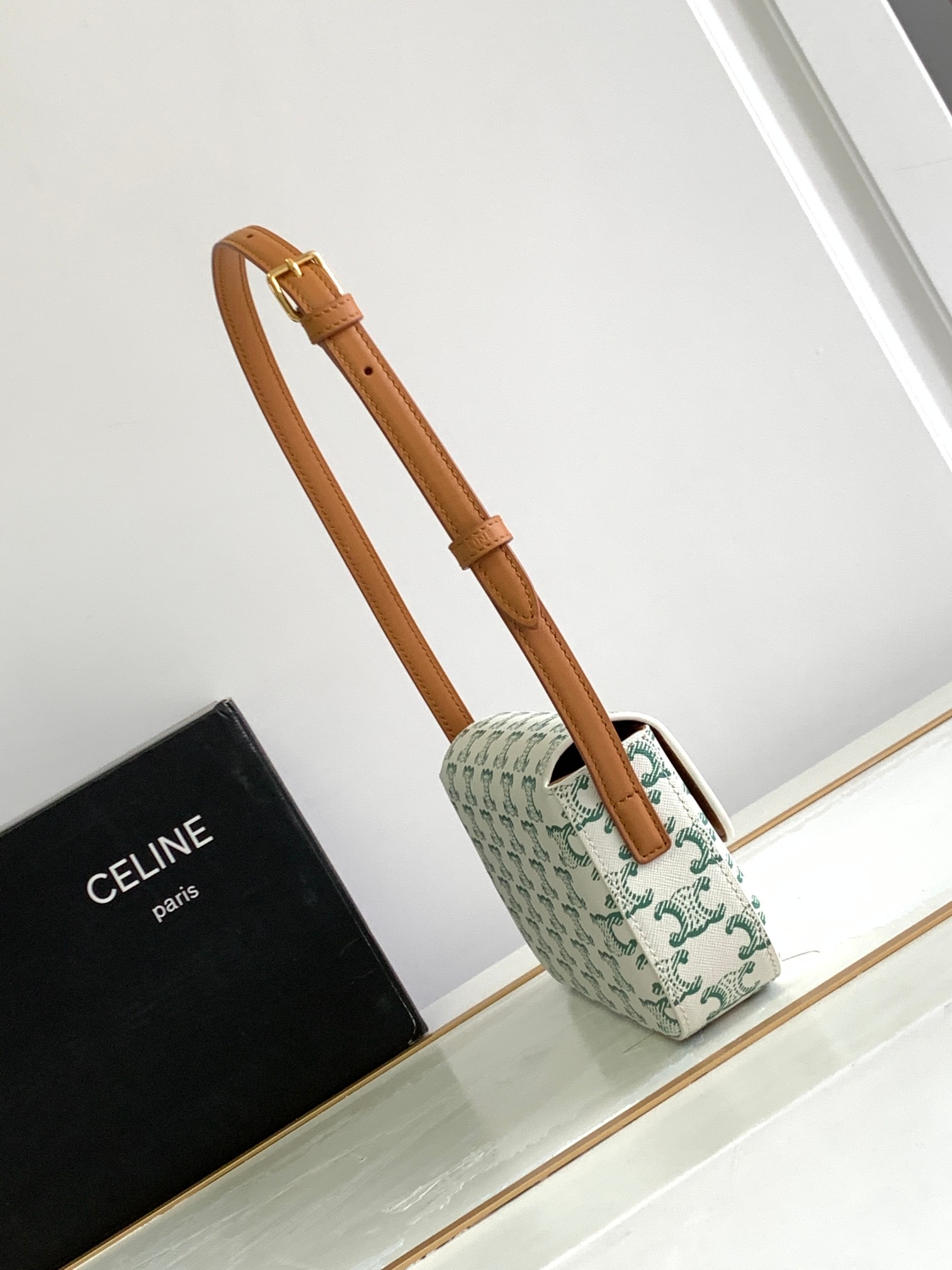 Ce**e shoulder bag triomphe