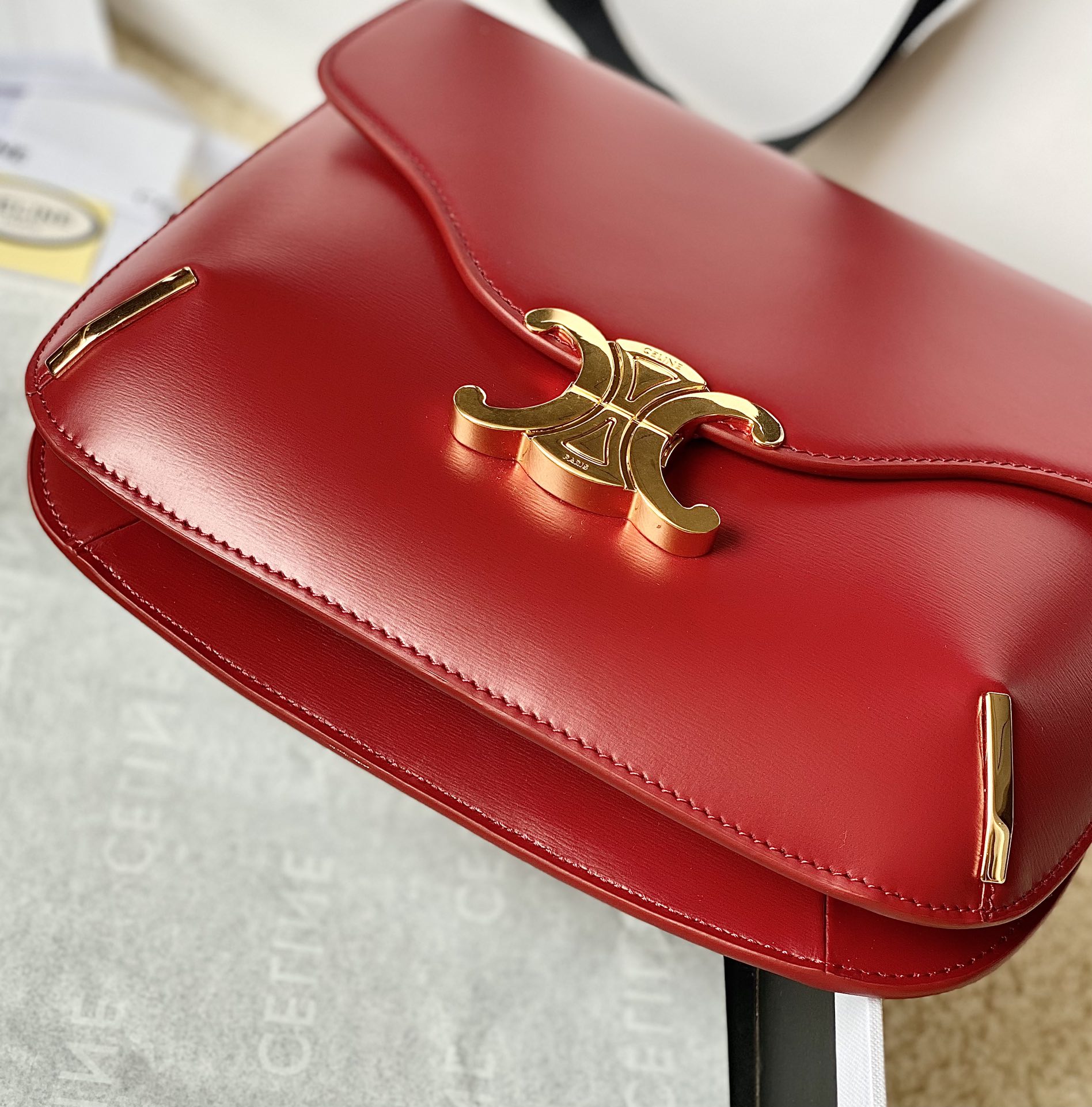 Ce**e besace triomphe bag