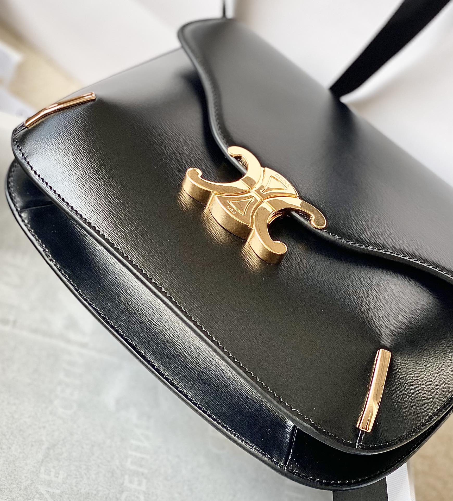 Ce**e besace triomphe bag