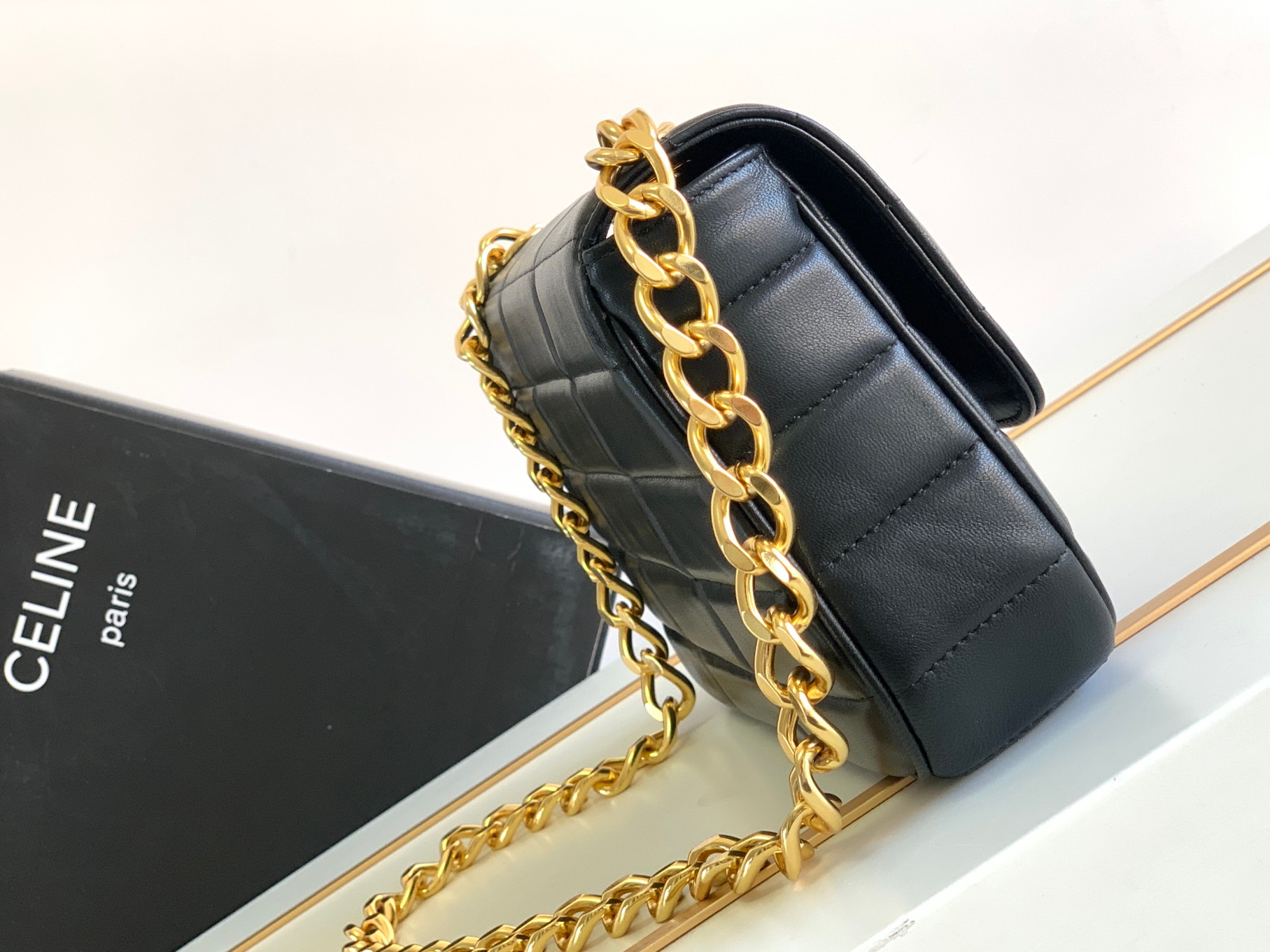 Ce**e chain shoulder bag matelasse monochrome