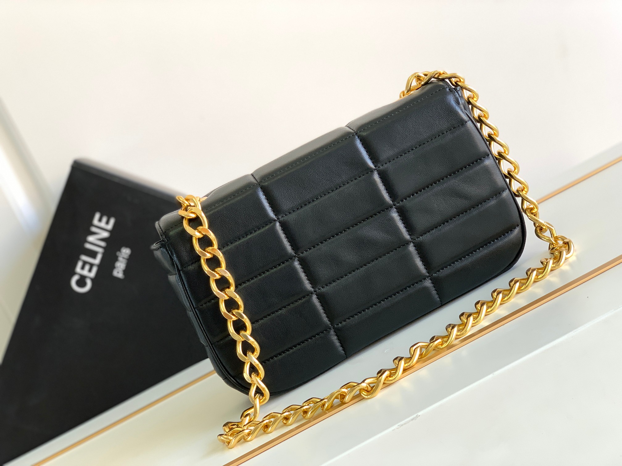 Ce**e chain shoulder bag matelasse monochrome