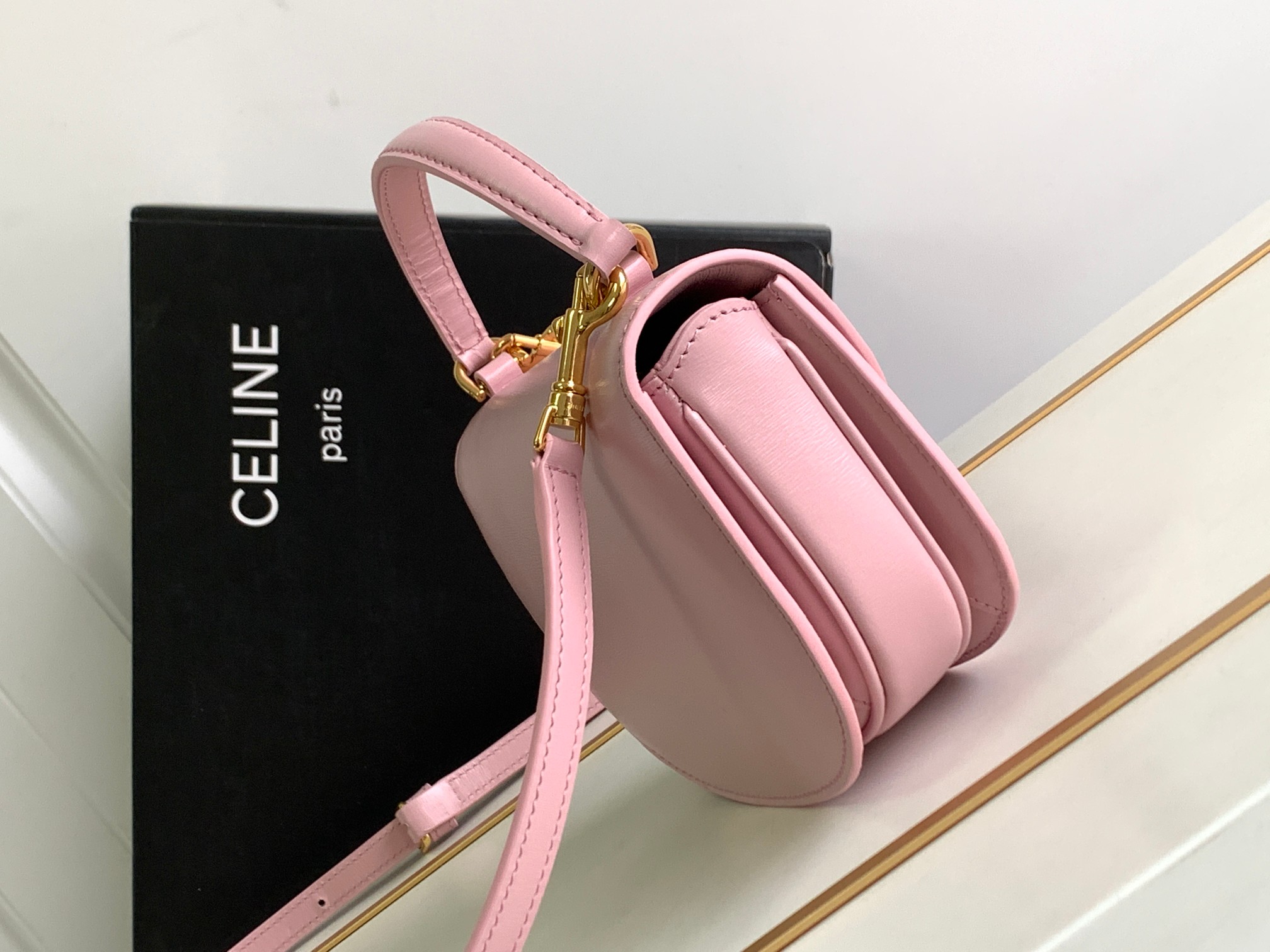 Ce**e mini besace triomphe