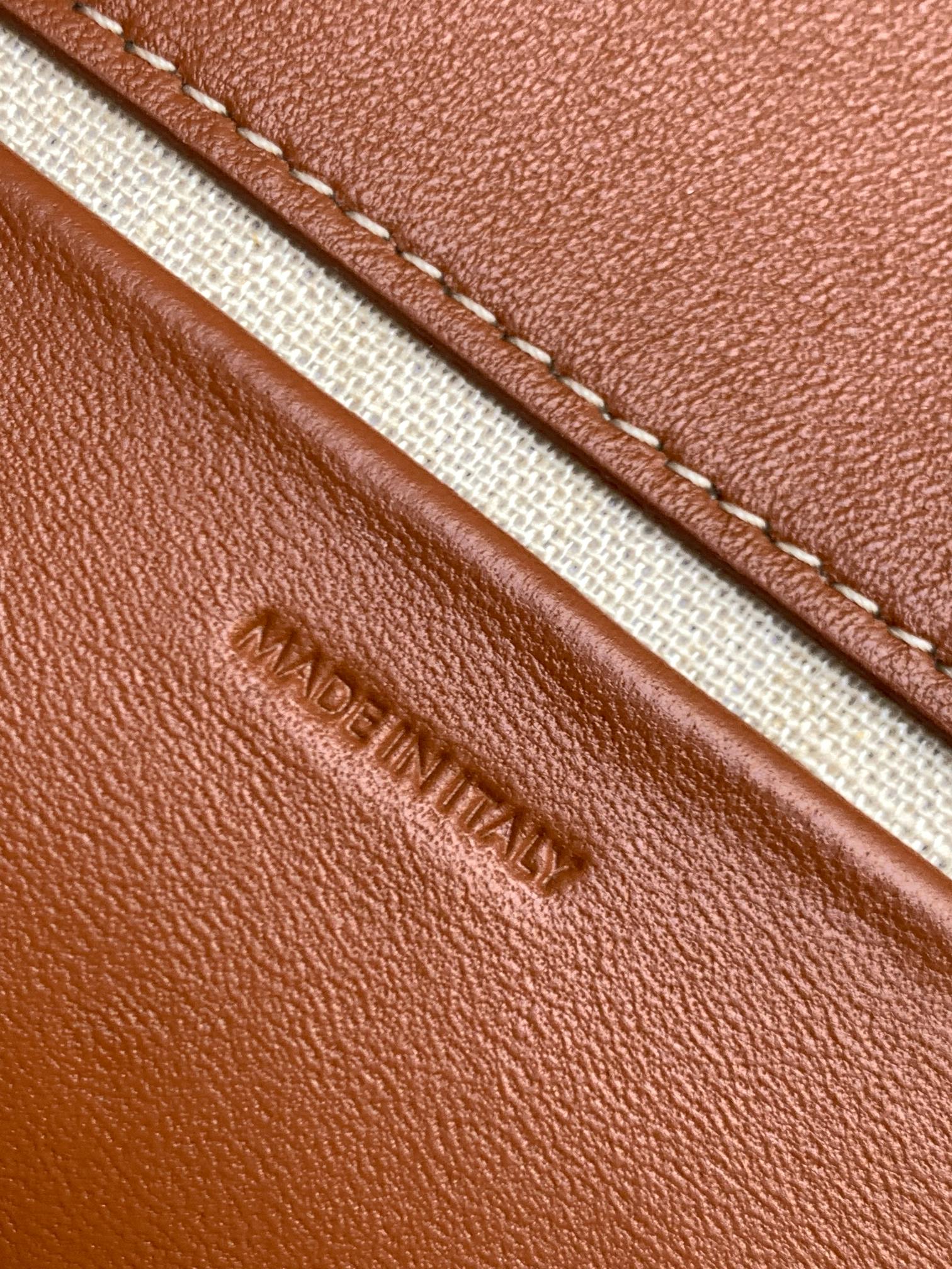 Ce**e besace cuir triomphe