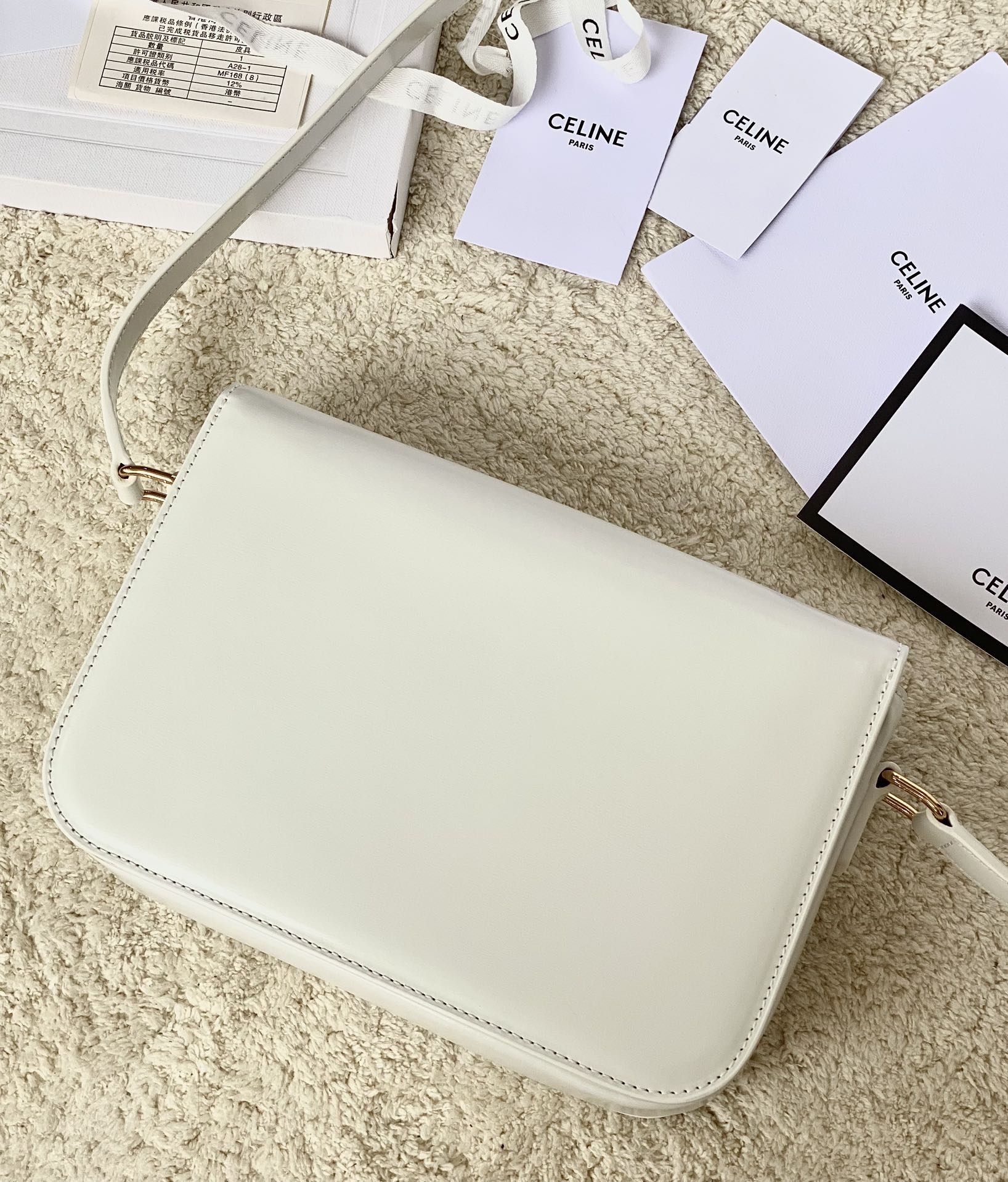 Ce**e classique triomphe bag