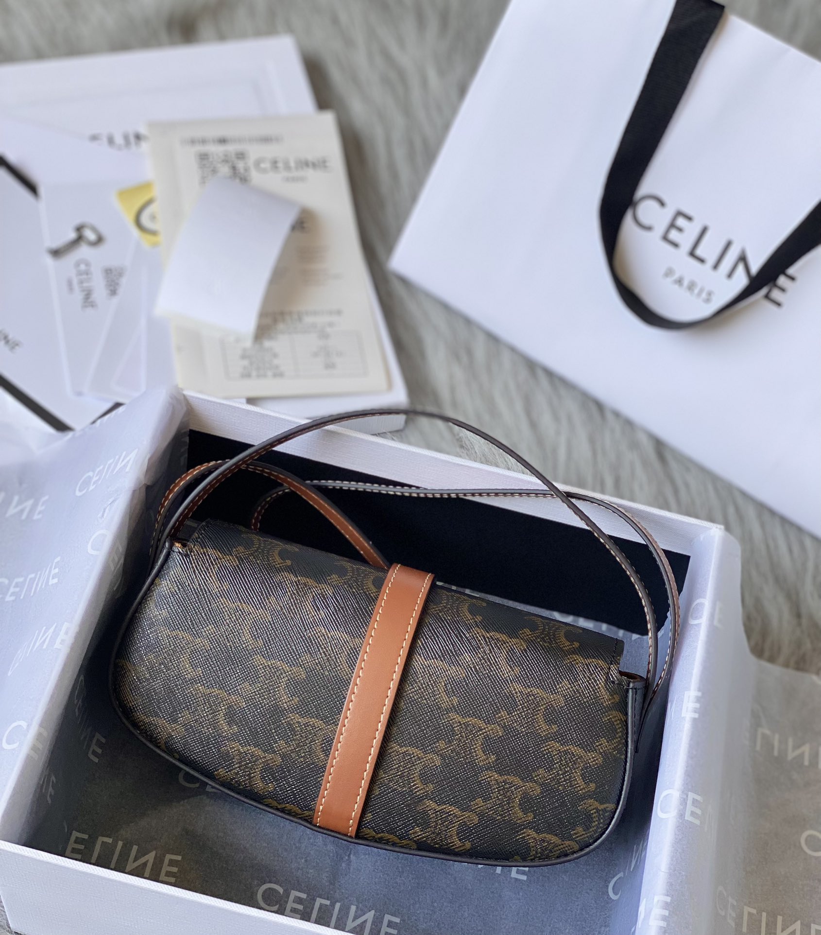 Ce**e mini tabou clutch on strap