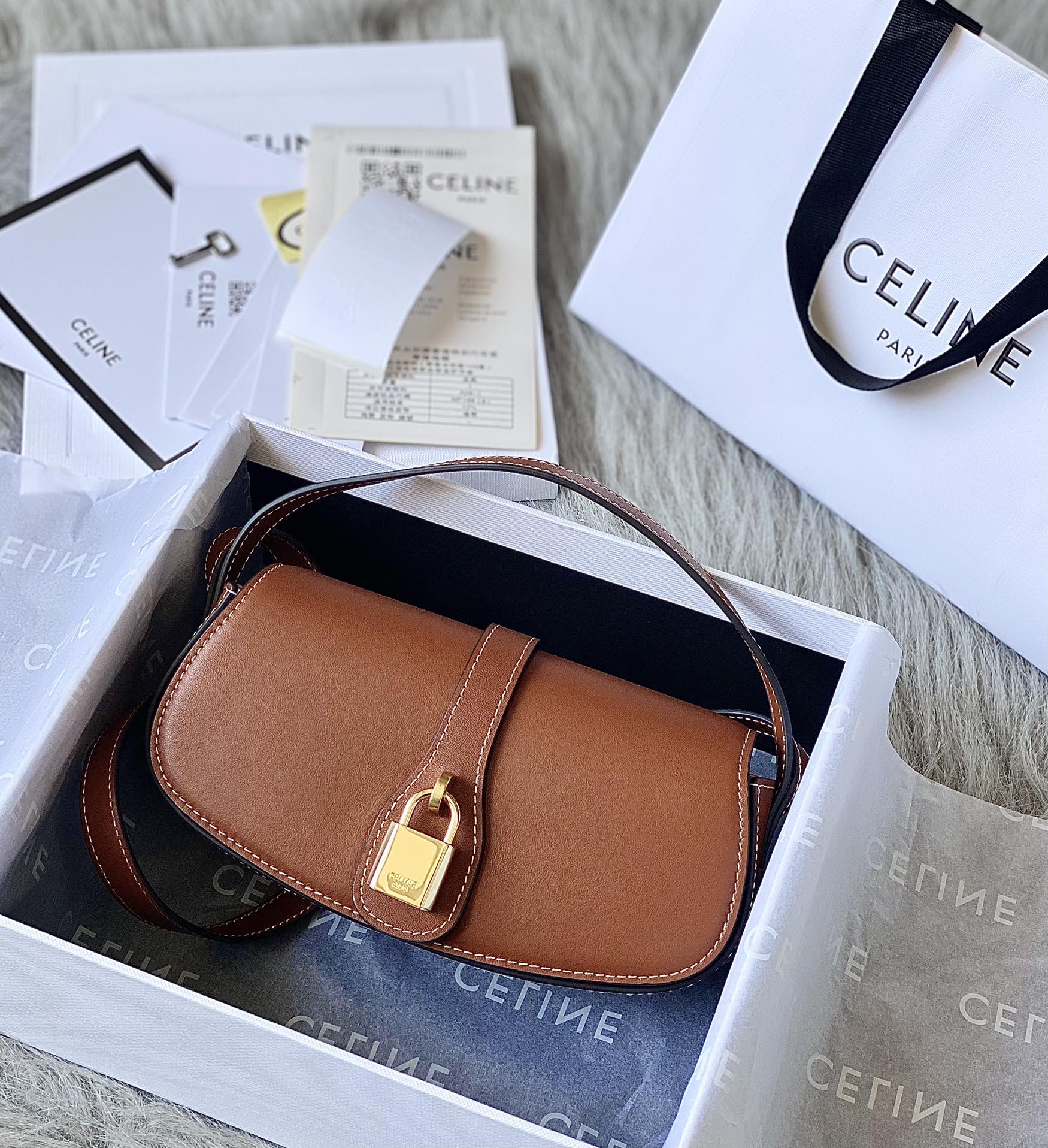 Ce**e mini tabou clutch on strap