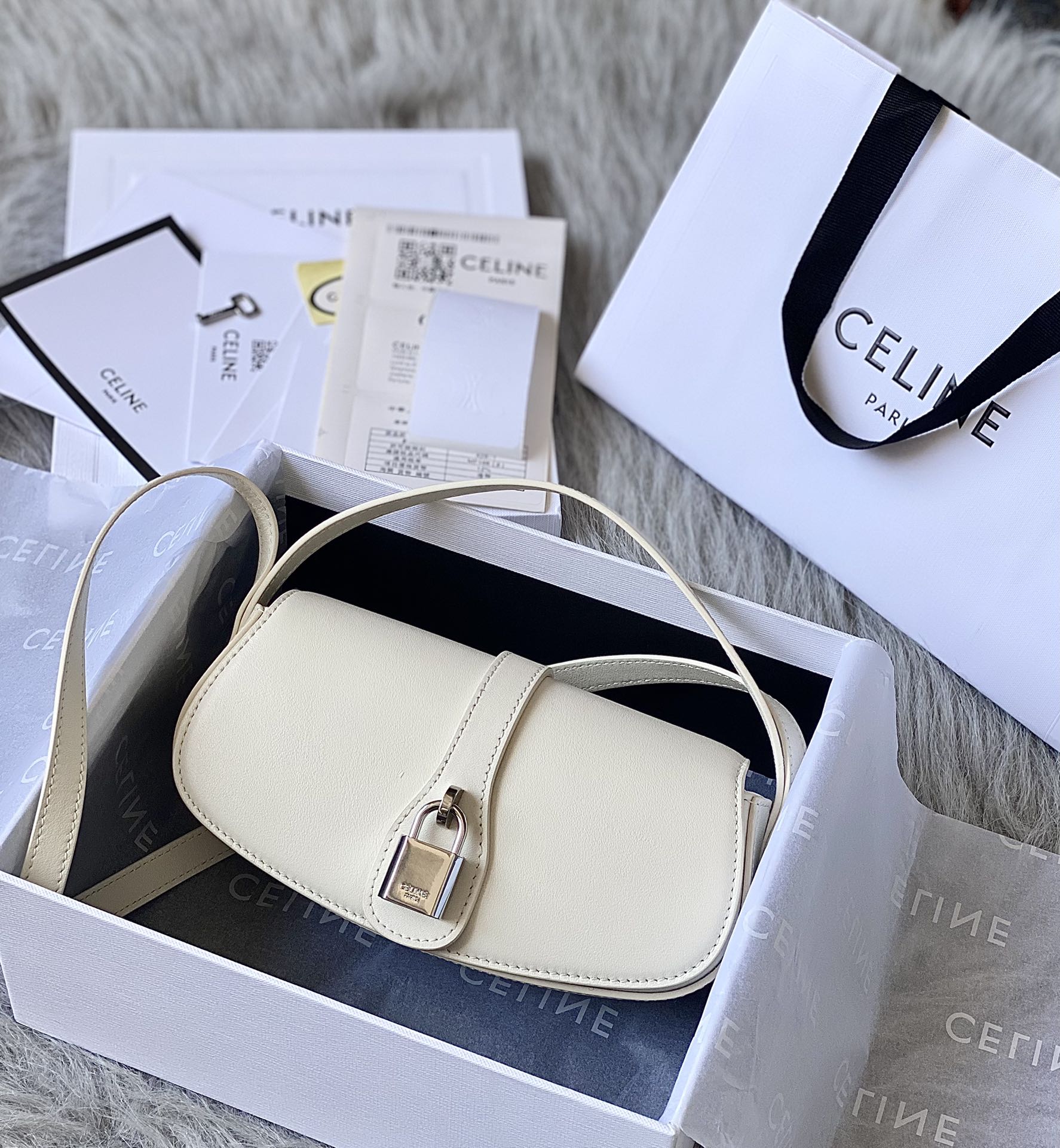 Ce**e mini tabou clutch on strap