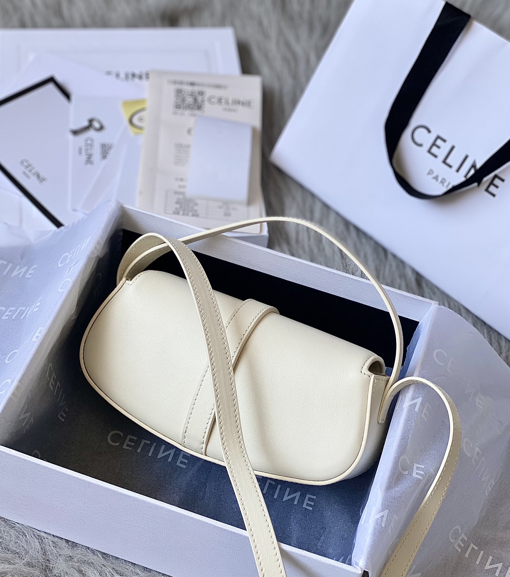 Ce**e mini tabou clutch on strap