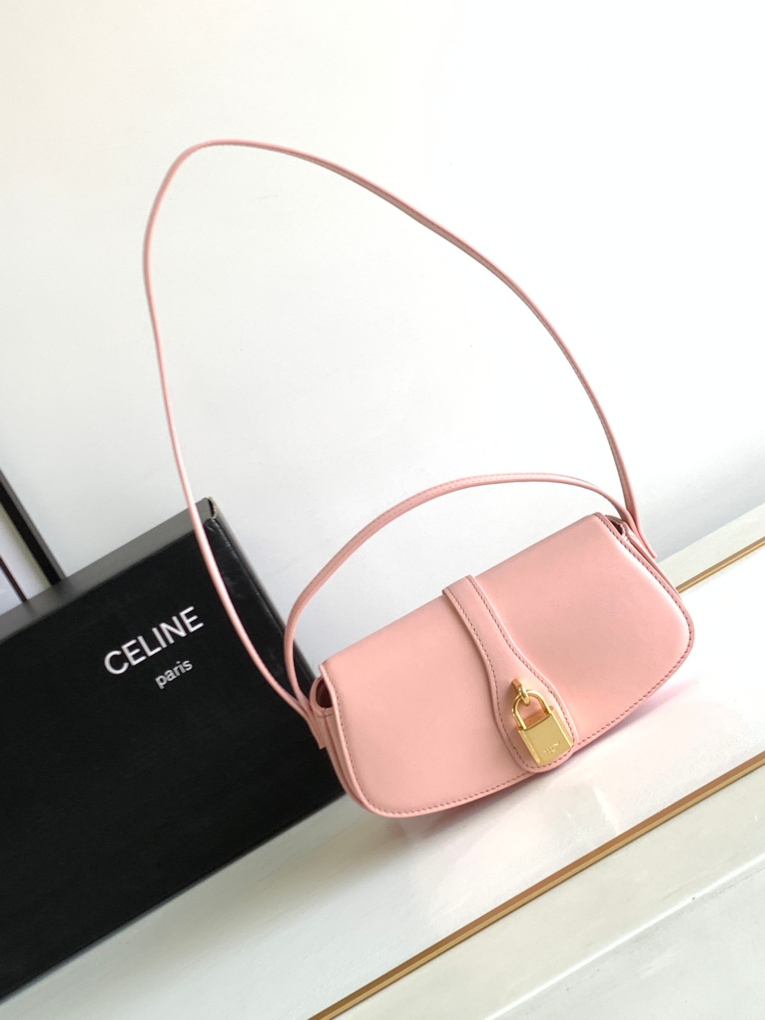 Ce**e mini tabou clutch on strap