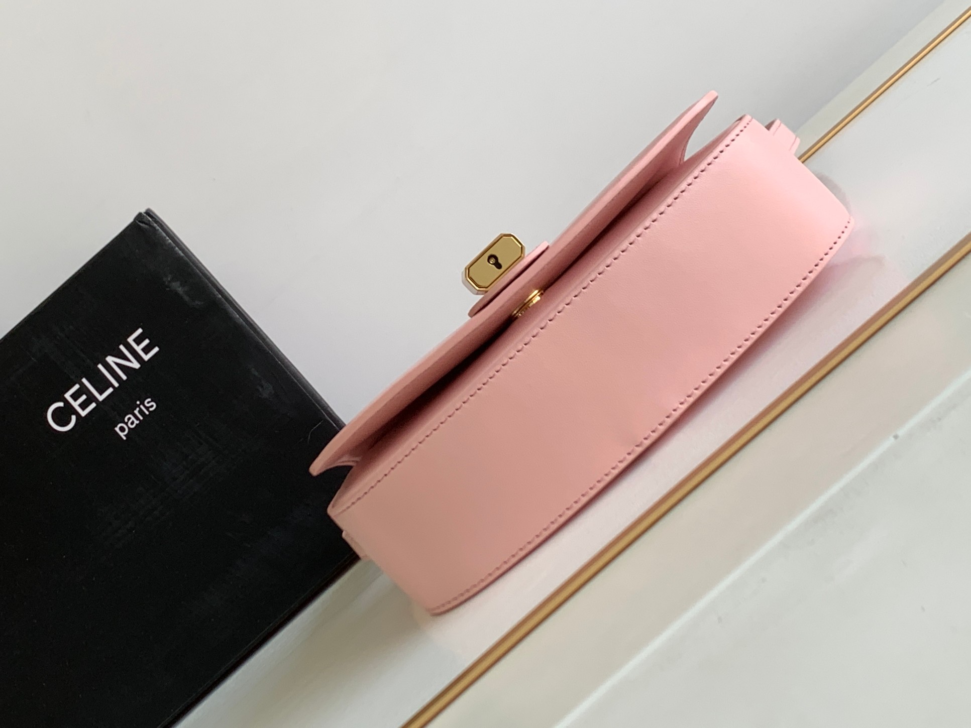 Ce**e mini tabou clutch on strap