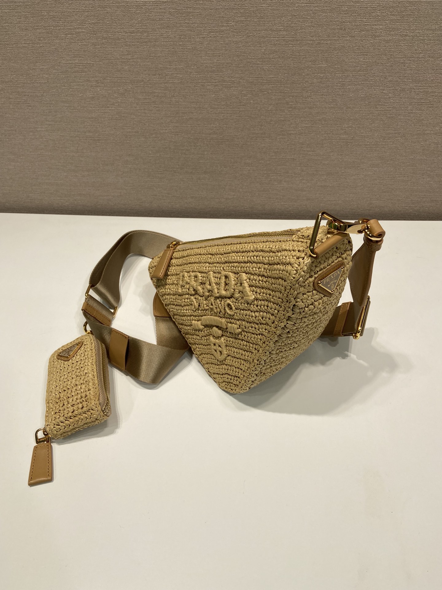 Pra*a triangle shoulder bag