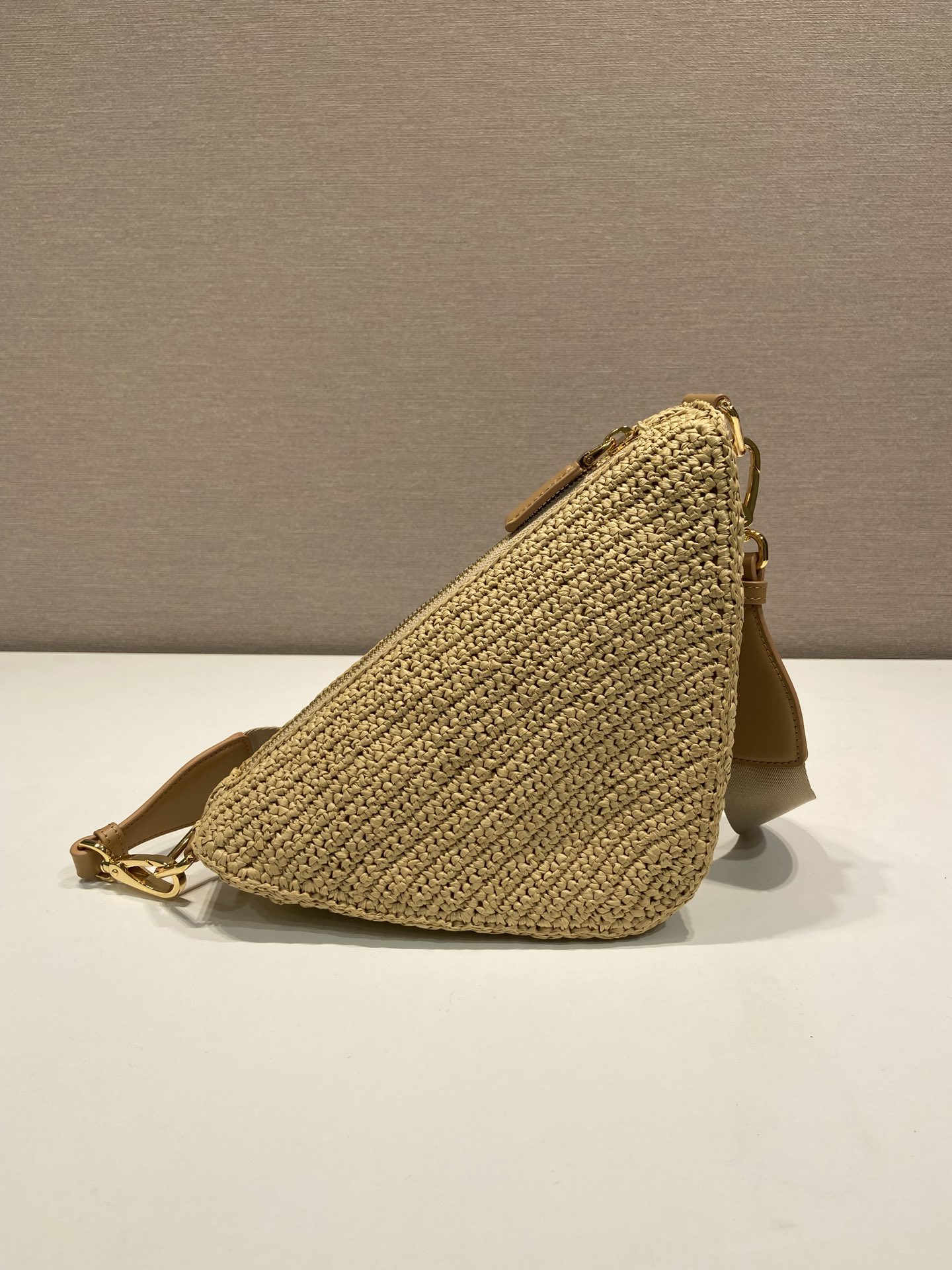Pra*a triangle shoulder bag