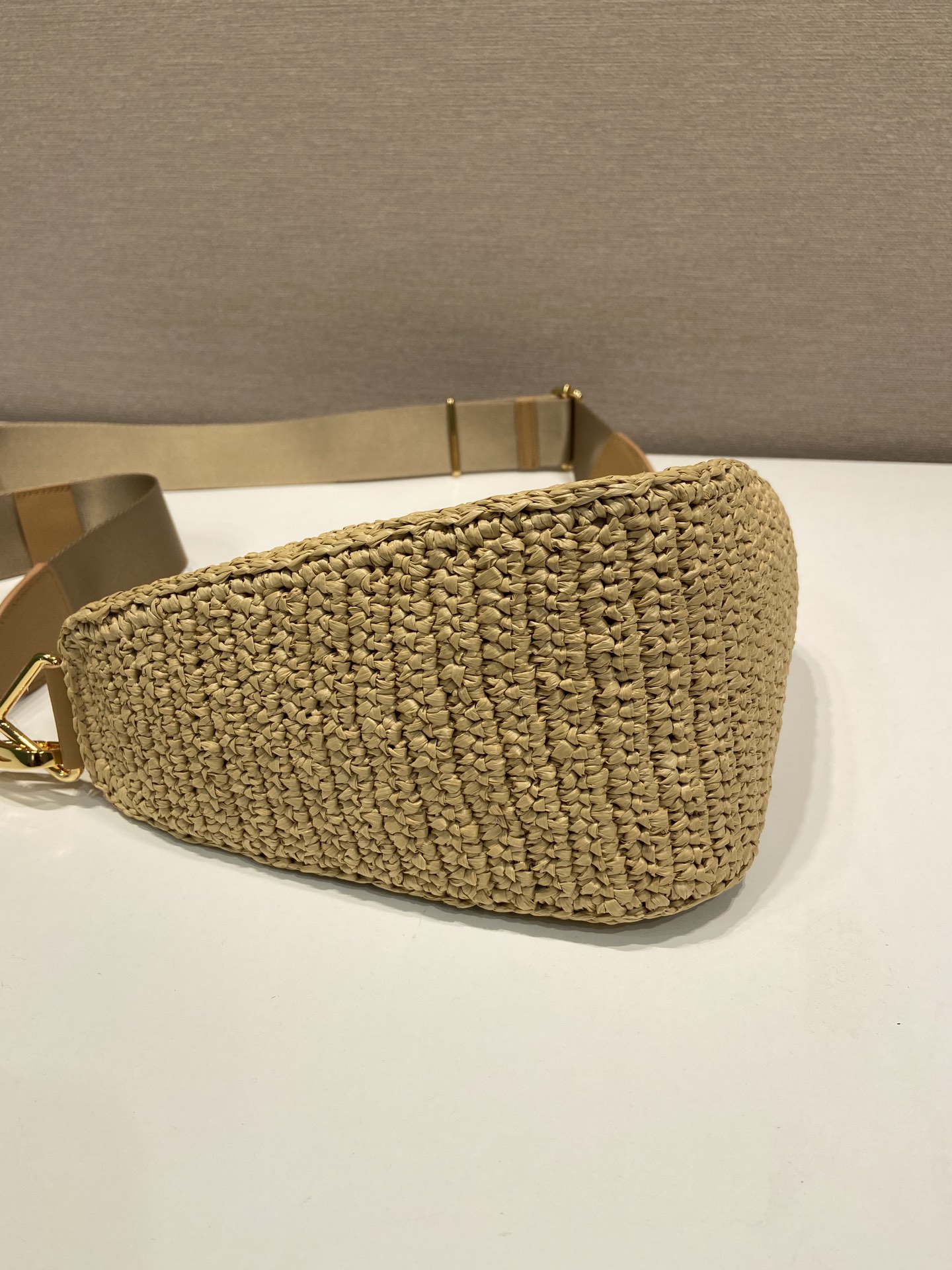 Pra*a triangle shoulder bag