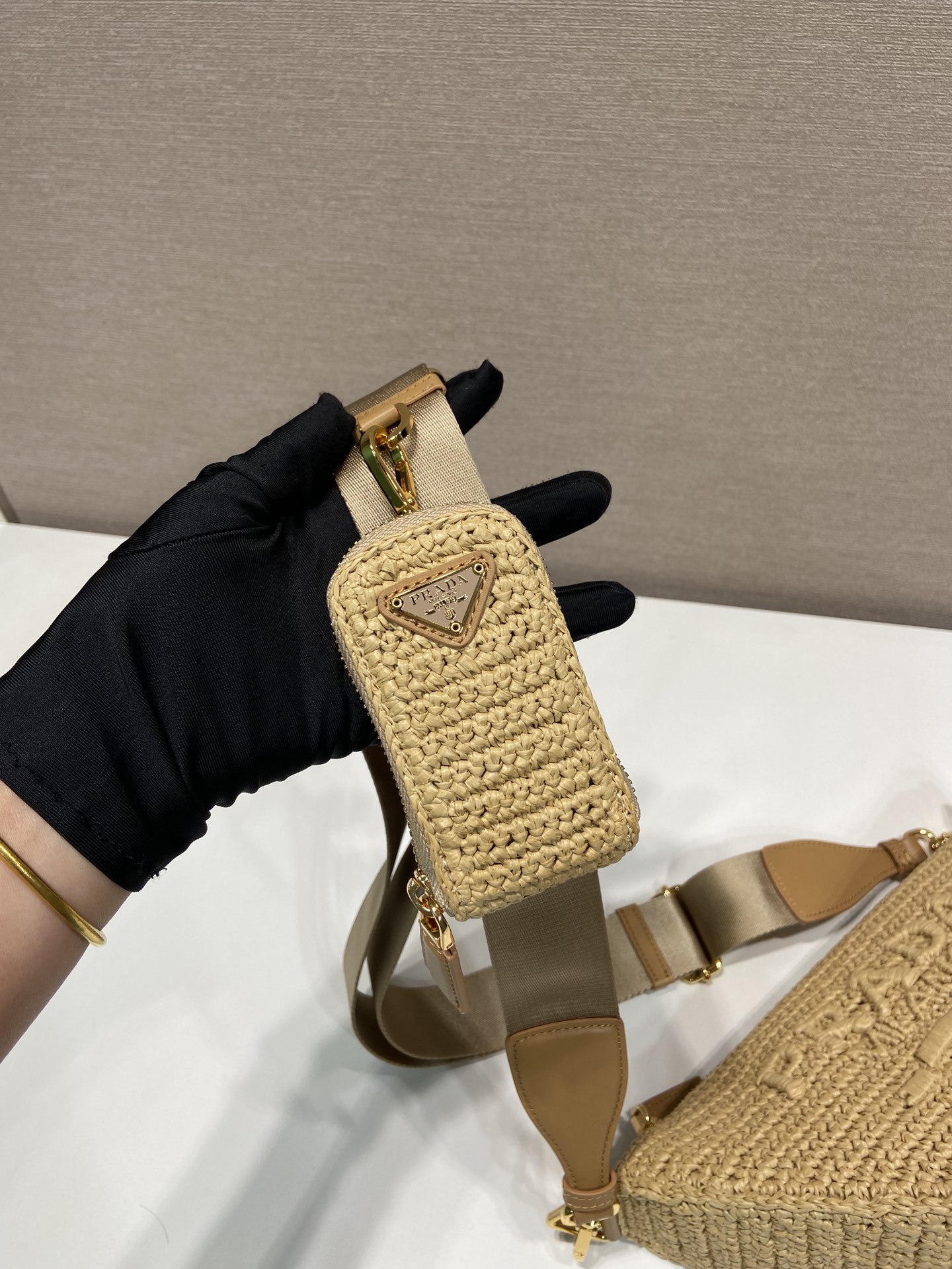 Pra*a triangle shoulder bag