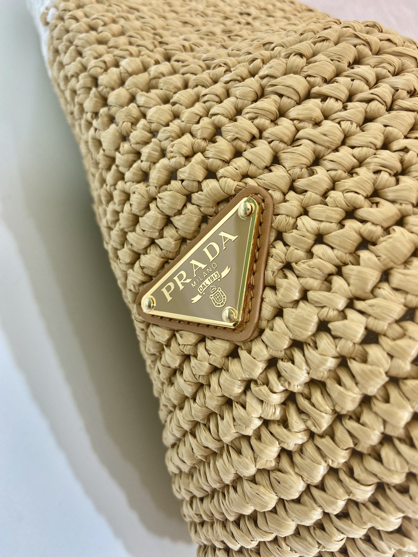 Pra*a crochet and leather tote bag