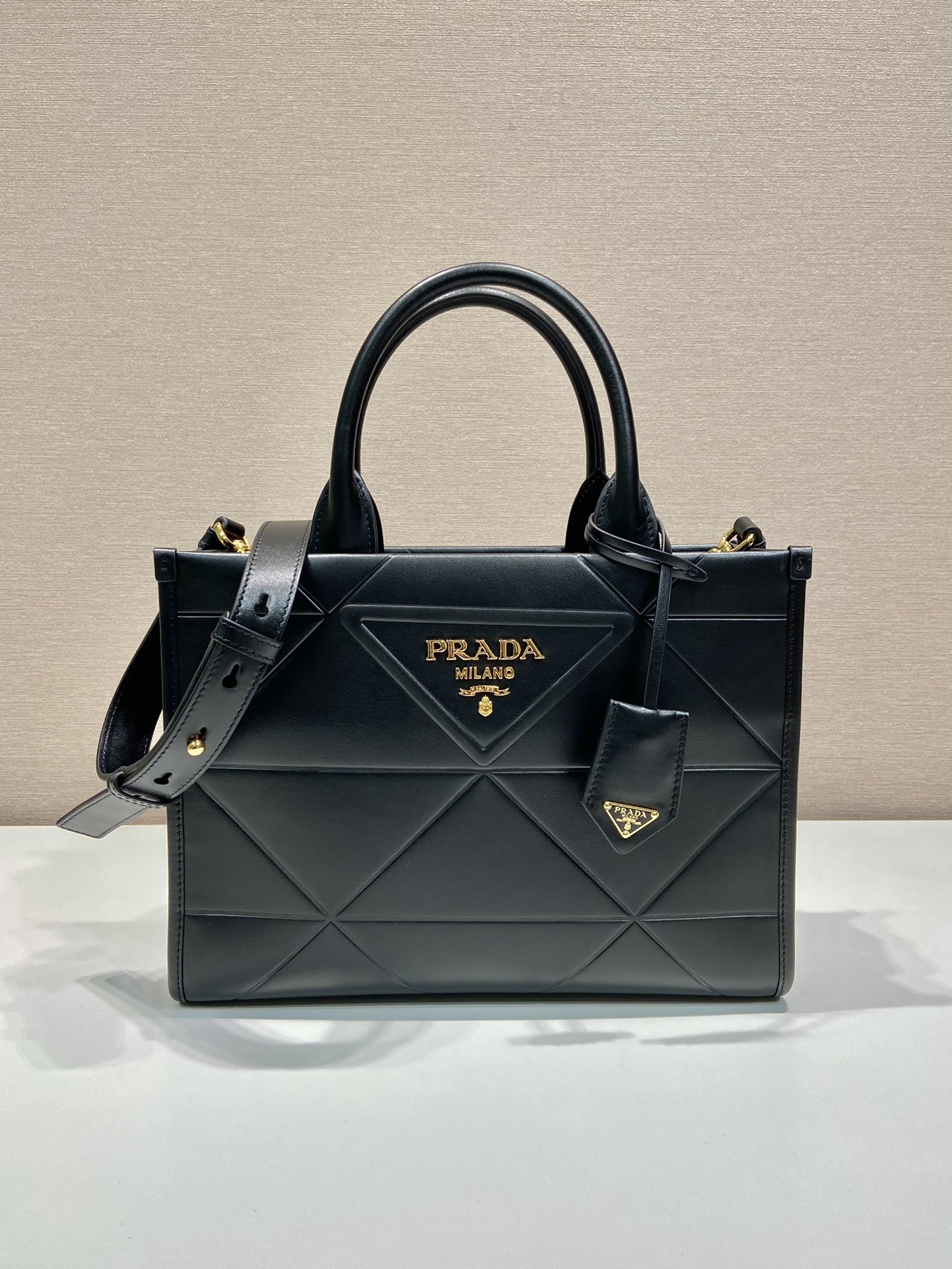Pra*a small leather Pra*a symbole bag with topstitching