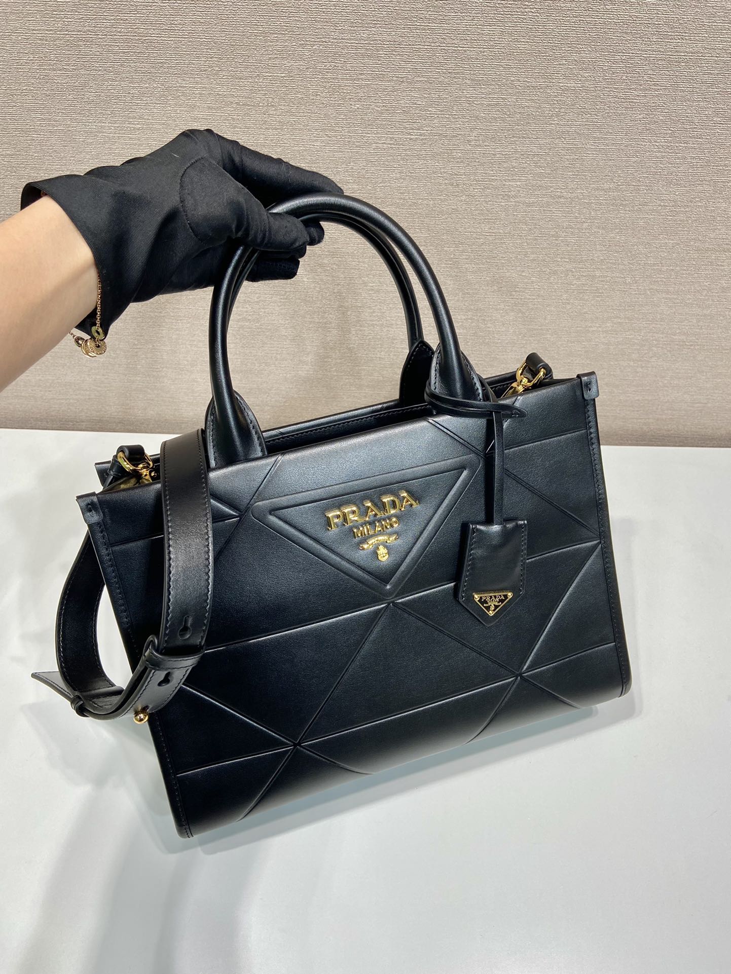 Pra*a small leather Pra*a symbole bag with topstitching