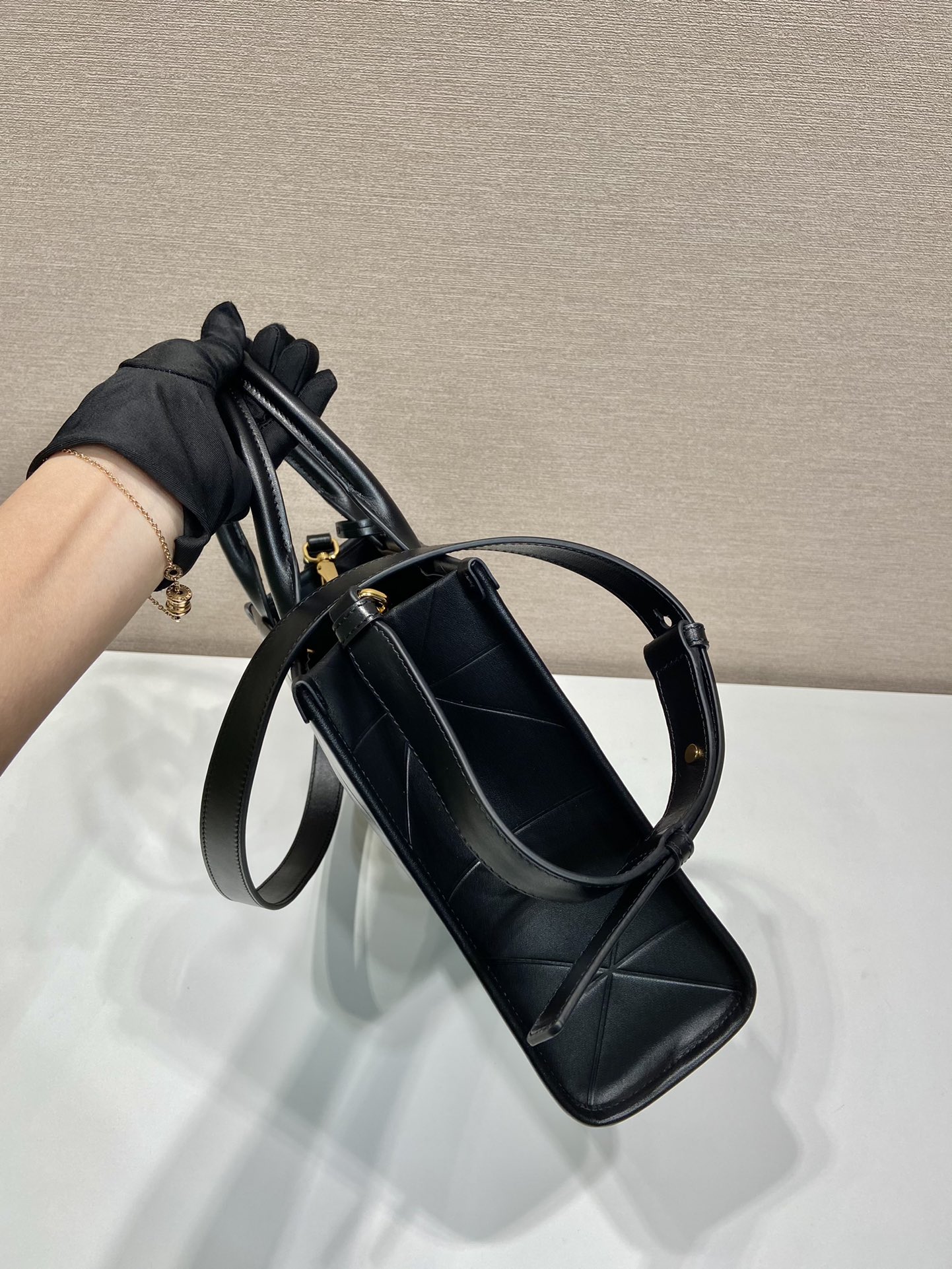 Pra*a small leather Pra*a symbole bag with topstitching
