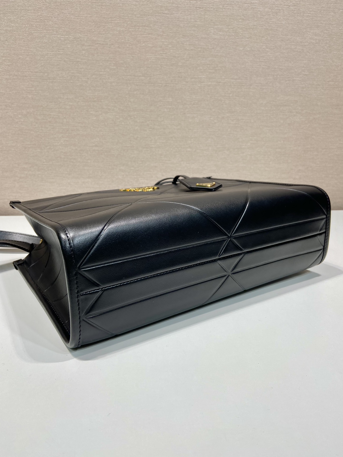 Pra*a small leather Pra*a symbole bag with topstitching