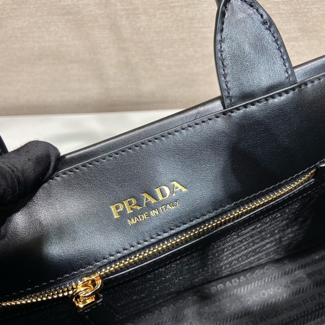Pra*a small leather Pra*a symbole bag with topstitching
