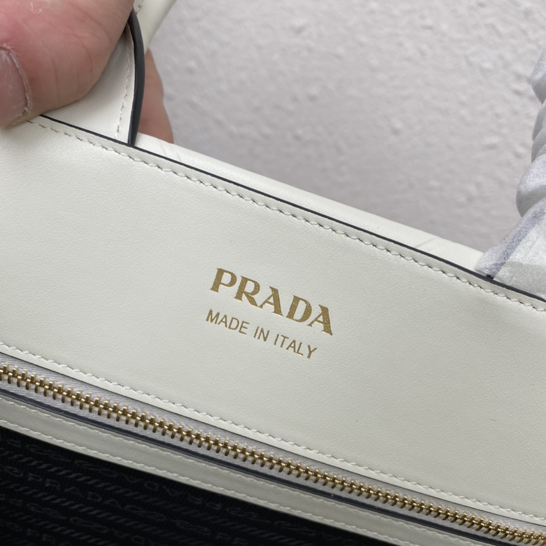 Pra*a small leather Pra*a symbole bag with topstitching