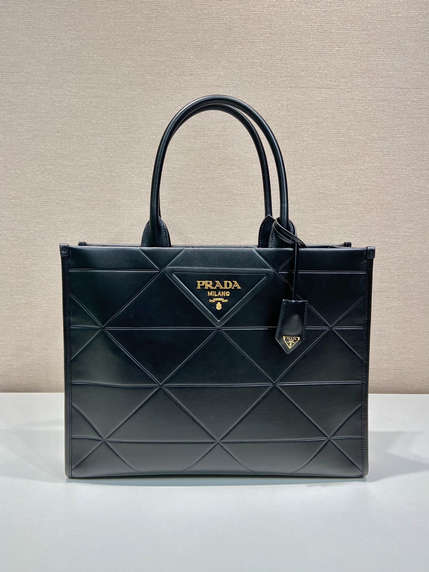 Pra*a large leather Pra*a symbole bag with topstitching