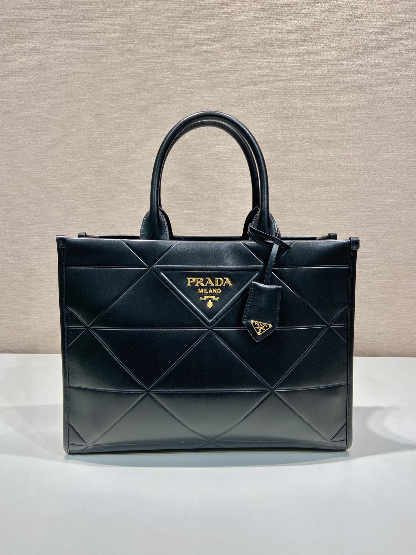 Pra*a medium leather Pra*a symbole bag with topstitching