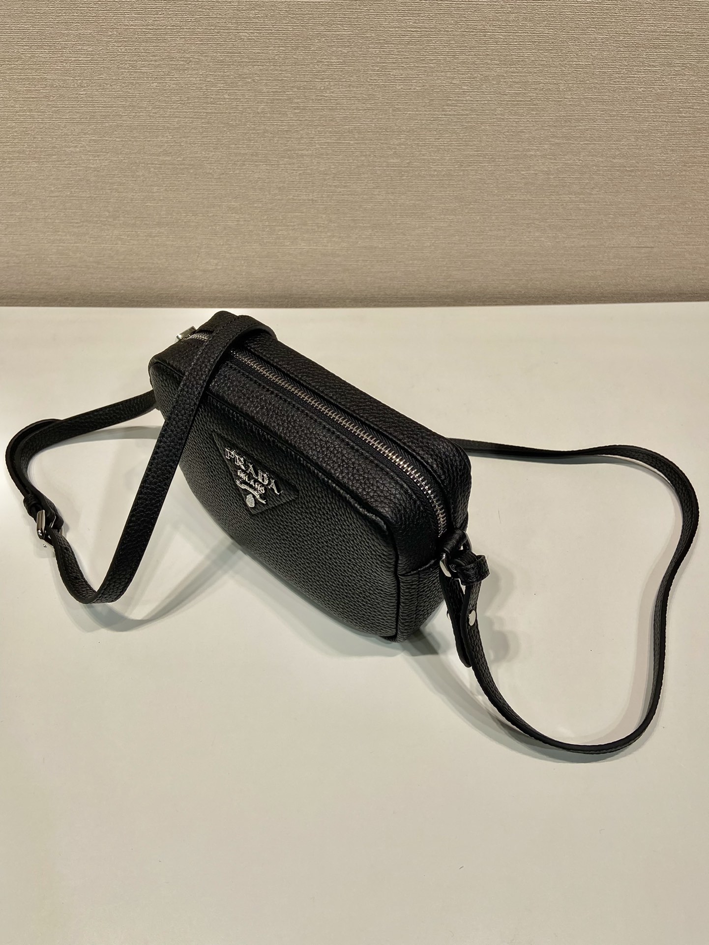 Pra*a small leather bag
