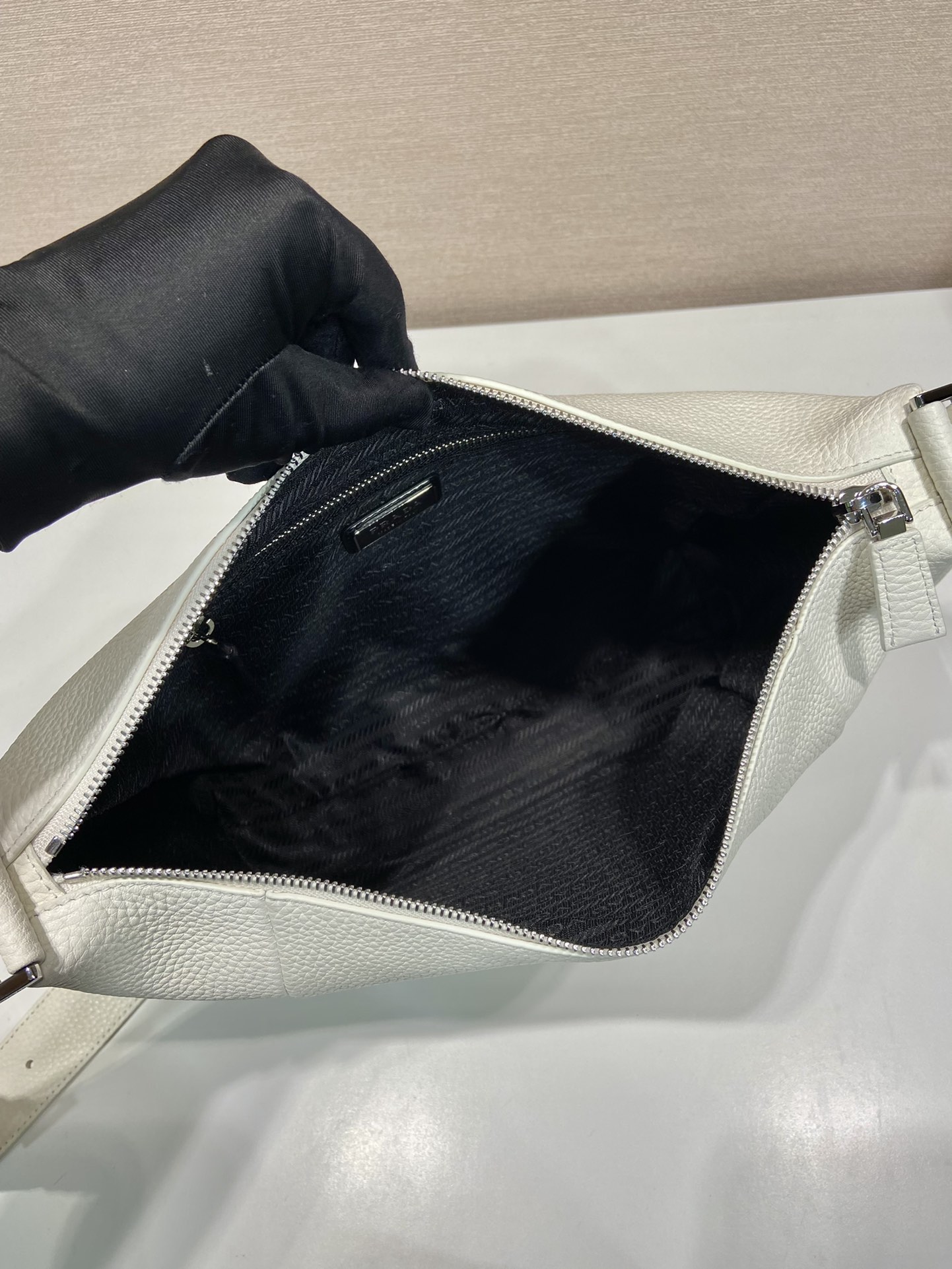 Pra*a leather bag with shoulder strap