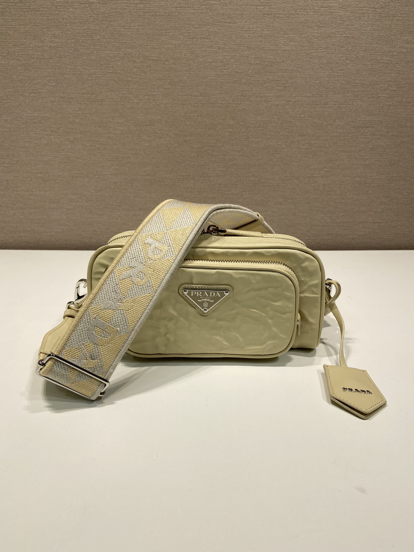 Pra*a nappa antique leather multi-pocket shoulder bag