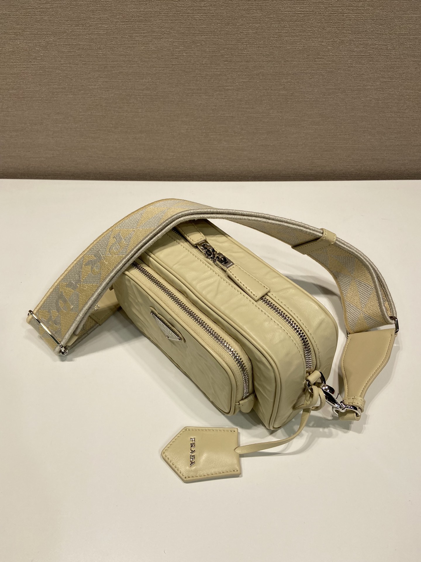 Pra*a nappa antique leather multi-pocket shoulder bag