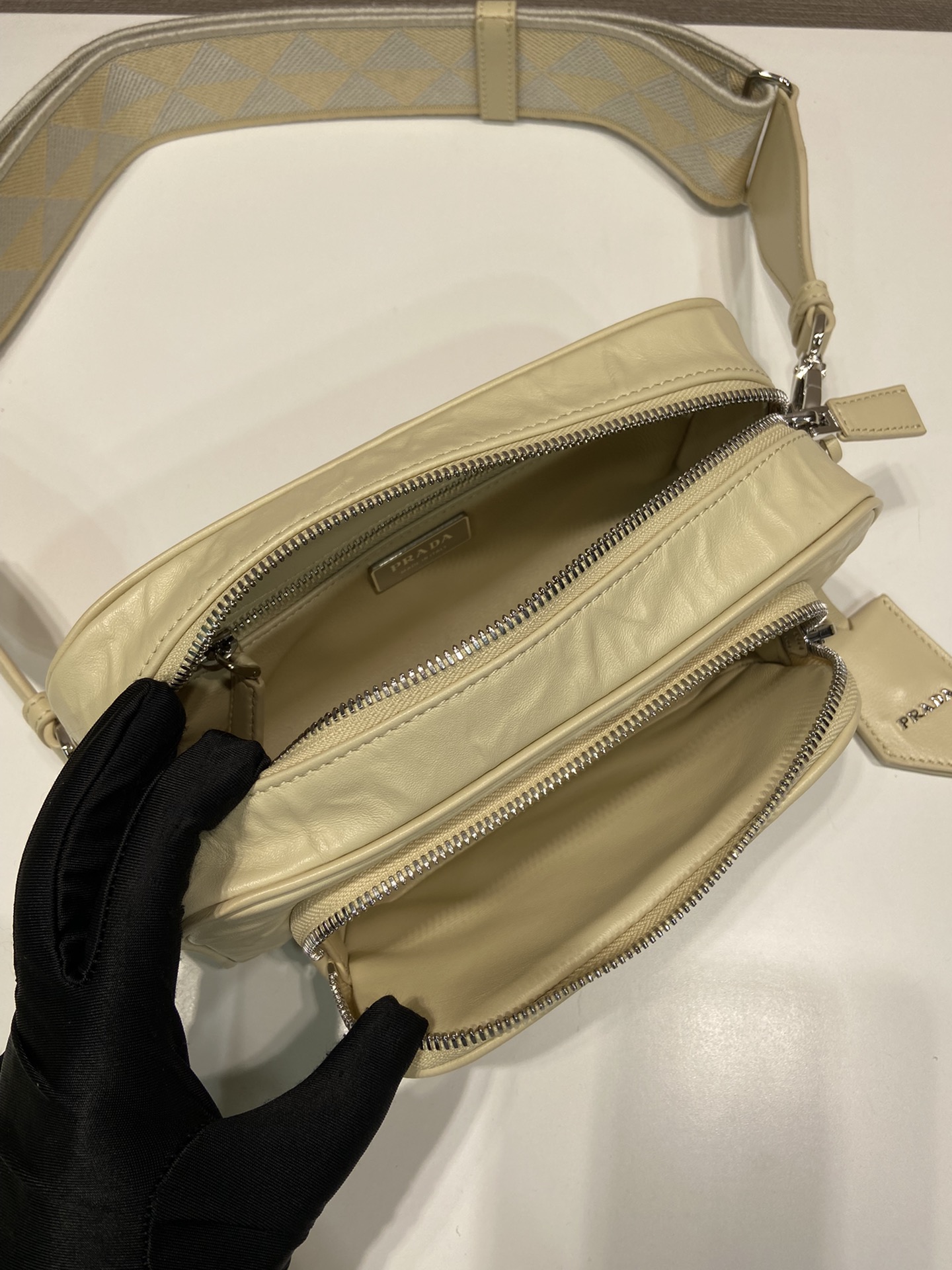 Pra*a nappa antique leather multi-pocket shoulder bag