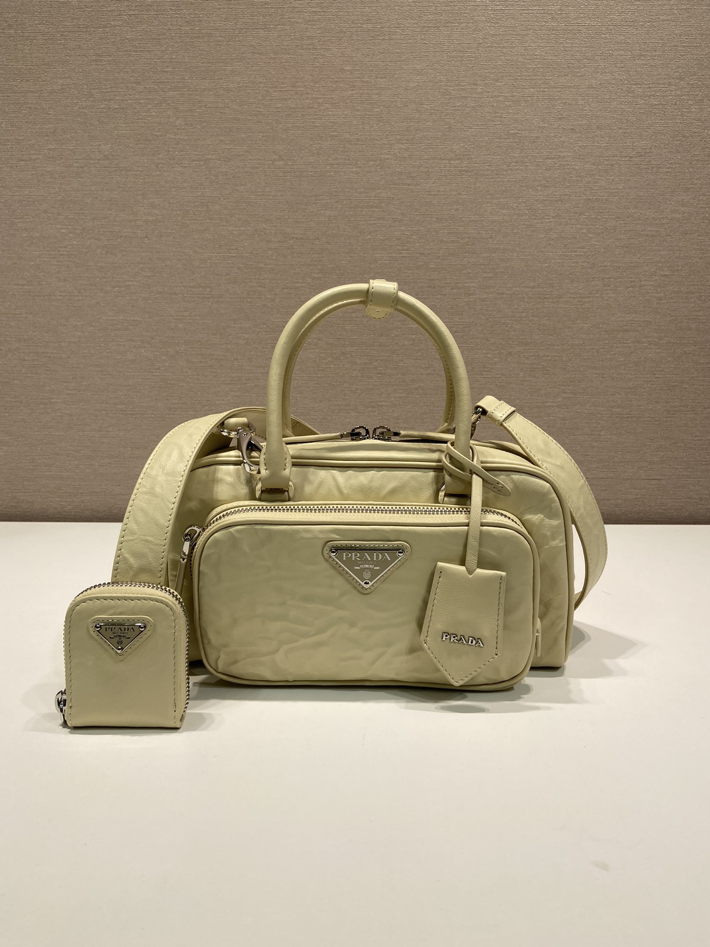 Pra*a antique nappa leather multi-pocket top-handle bag