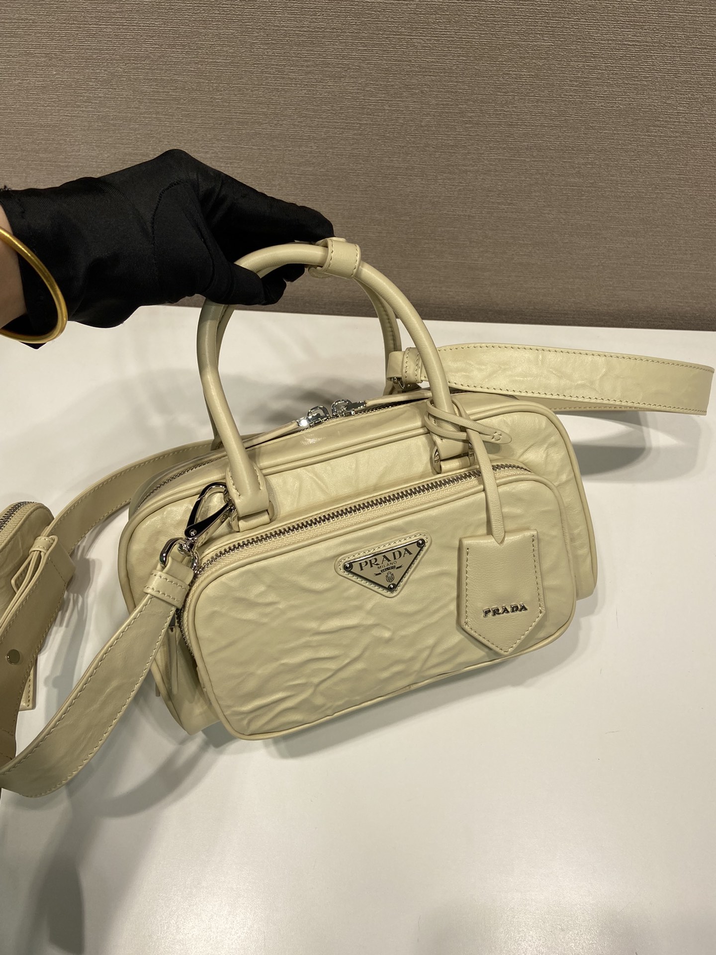 Pra*a antique nappa leather multi-pocket top-handle bag